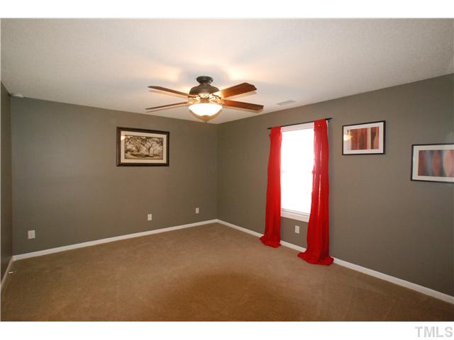 4300 Standing Rock Way Raleigh, NC 27604 - Photo 6 of 12 Large Master Bedroom with Nice Lighted Ceiling Fan.