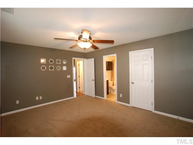 4300 Standing Rock Way Raleigh, NC 27604 - Photo 7 of 12 Master Bedroom has Large Walk-in Closet with Extra Shelving & Organizing Trays.