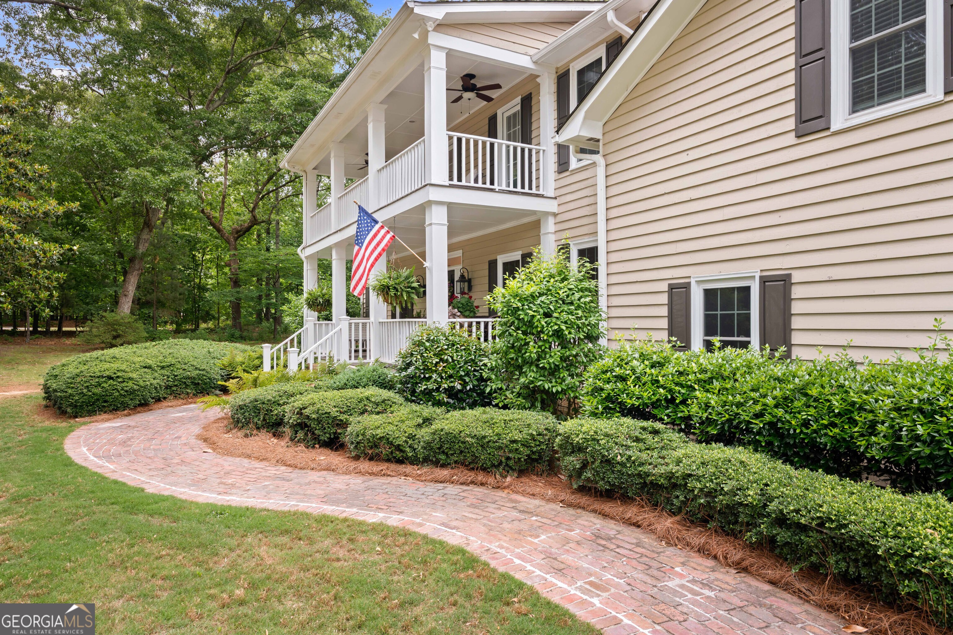 836 Oak Grove Road Carrollton, GA 30117 - Photo 6 of 50 a front view of a house with garden