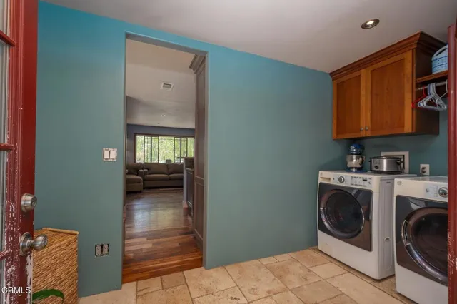 a bedroom with a bed and a walk in closet
