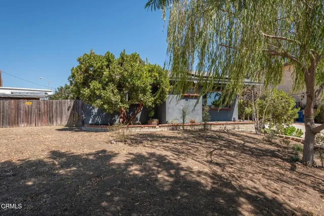 a view of a hallway with a glass door