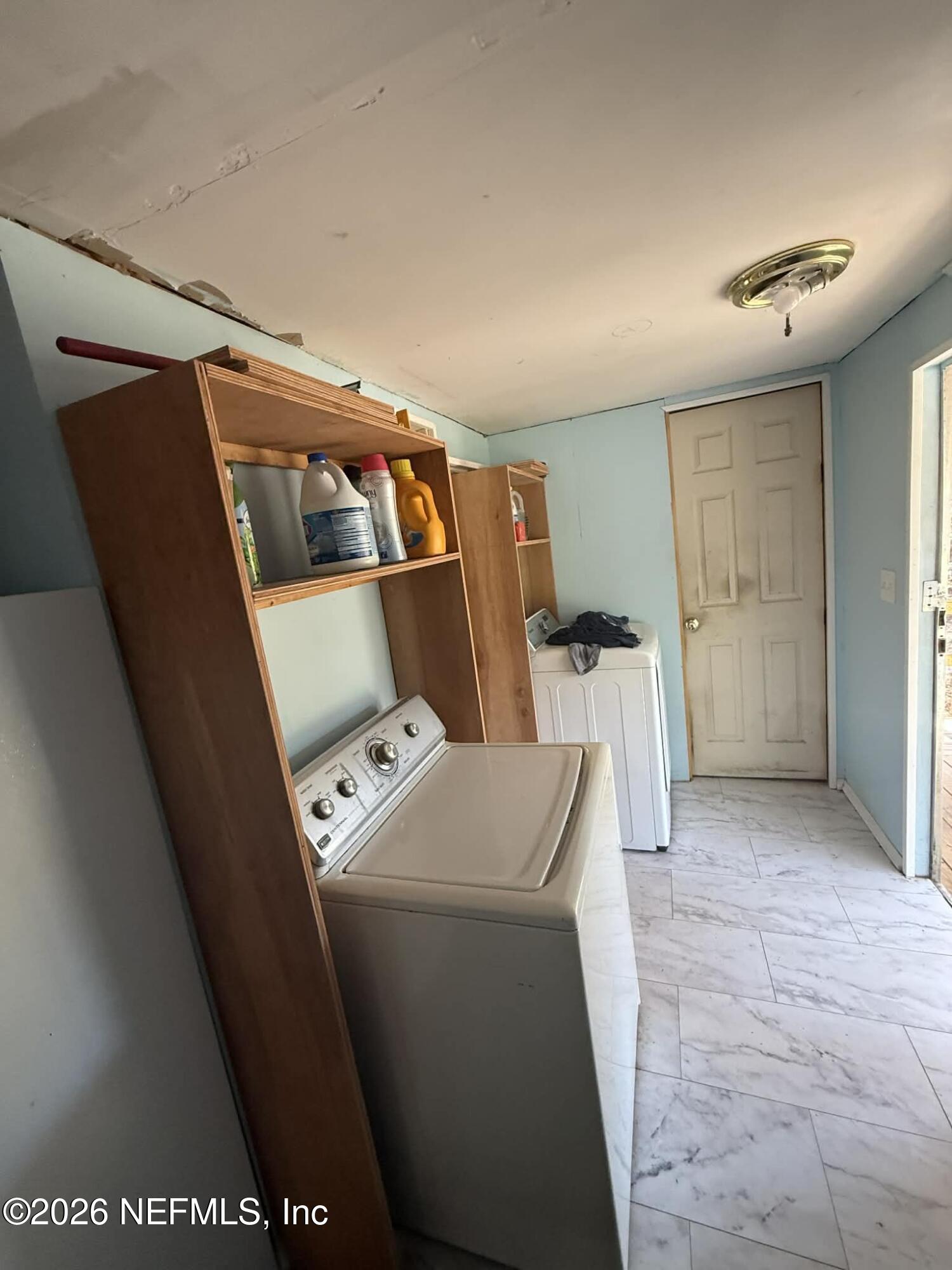 6319 Bucknell Avenue Keystone Heights, FL 32656 - Photo 11 of 11 a view of utility room with washer and dryer