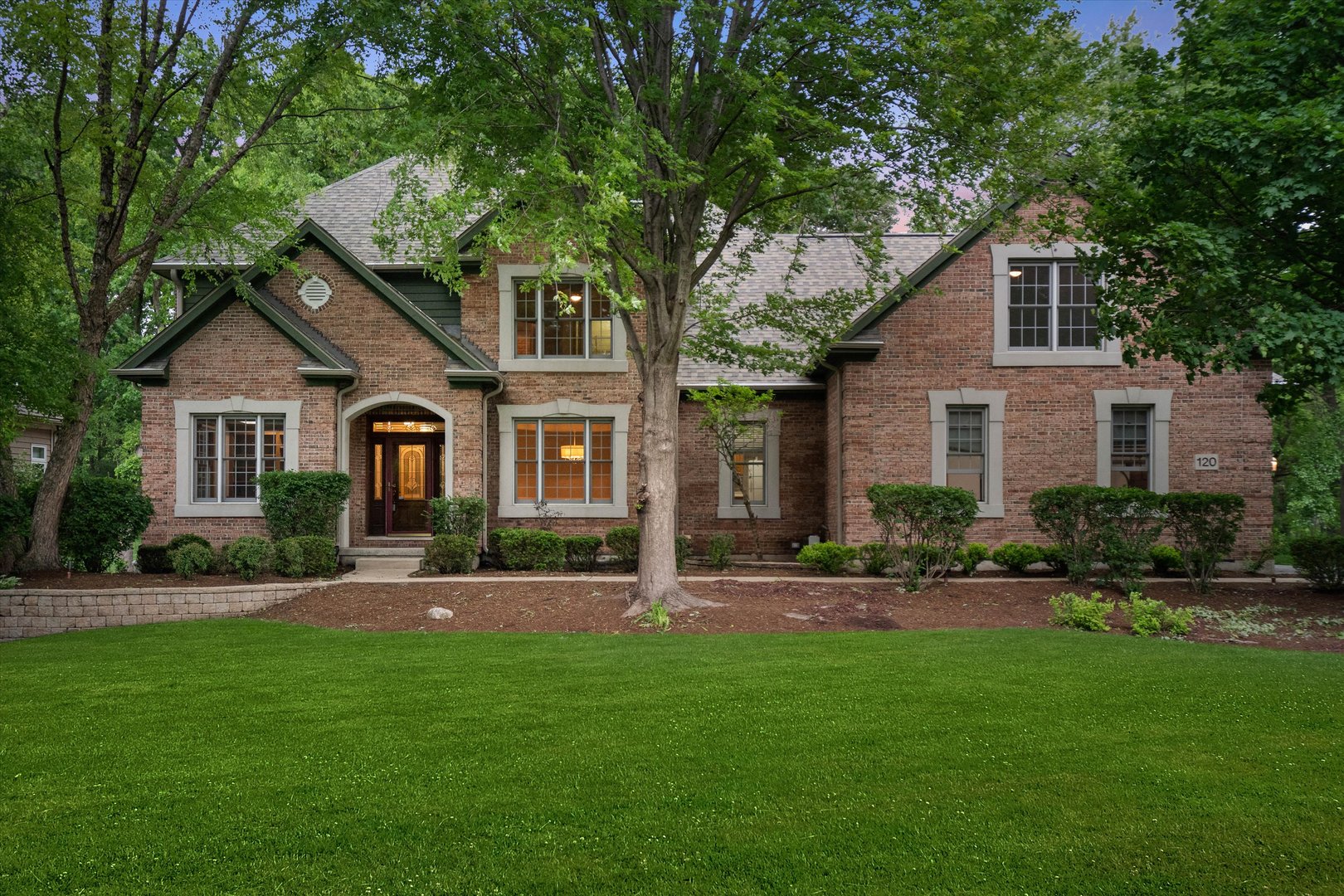 120 Fox Street Cary, IL 60013 - Photo 1 of 56 a front view of a house with a yard and trees