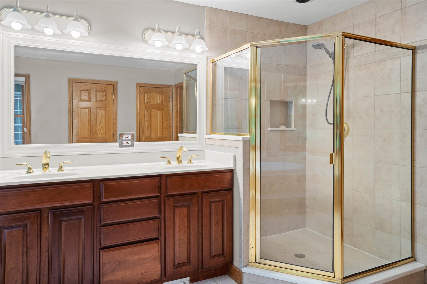 120 Fox Street Cary, IL 60013 - Photo 23 of 56 a bathroom with a double vanity sink mirror and shower