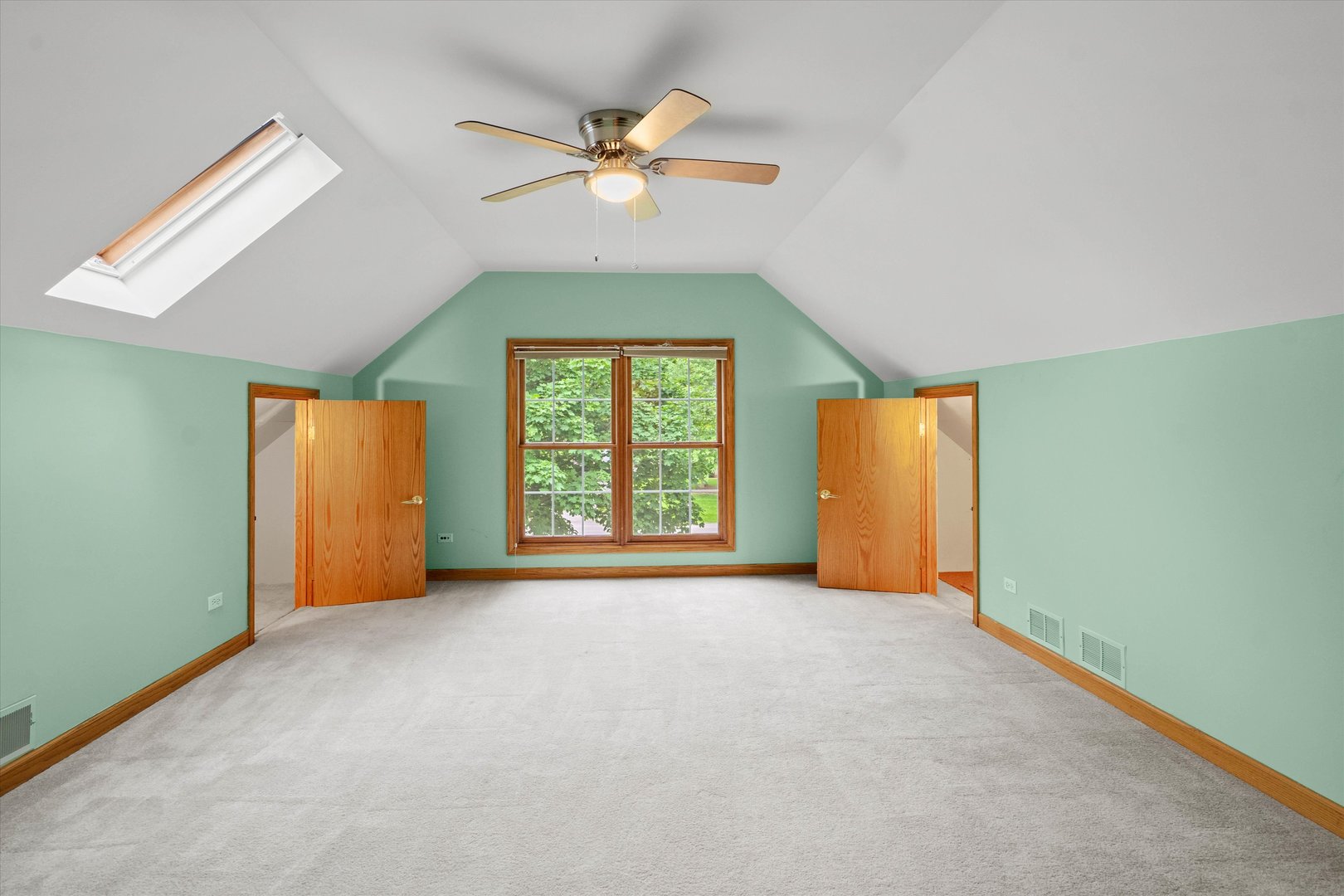 120 Fox Street Cary, IL 60013 - Photo 25 of 56 an empty room with a window and a ceiling fan