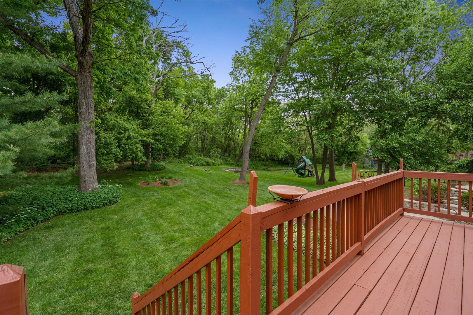 120 Fox Street Cary, IL 60013 - Photo 49 of 56 a view of a wooden deck with a yard