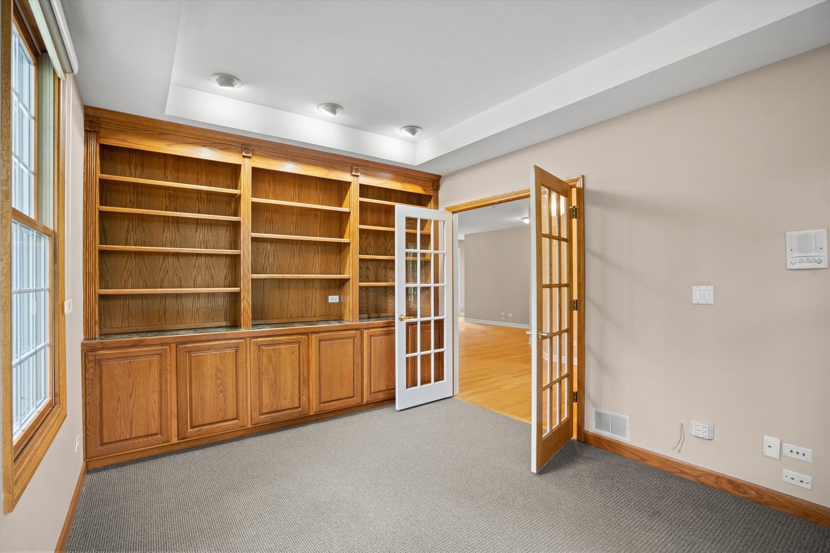 120 Fox Street Cary, IL 60013 - Photo 7 of 56 a view of an empty room with empty shelves