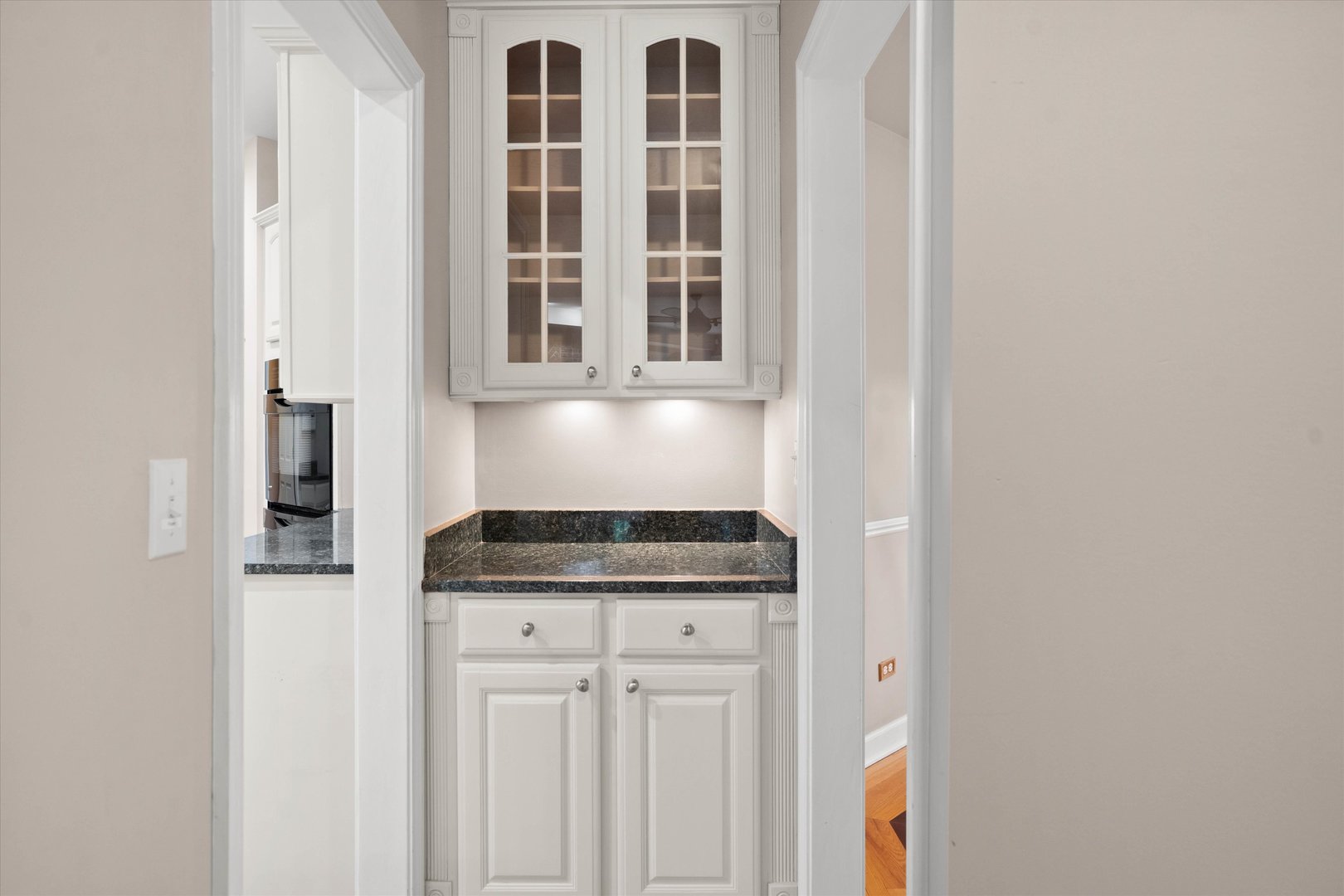 120 Fox Street Cary, IL 60013 - Photo 9 of 56 a kitchen with stainless steel appliances granite countertop white cabinets and a granite counter tops