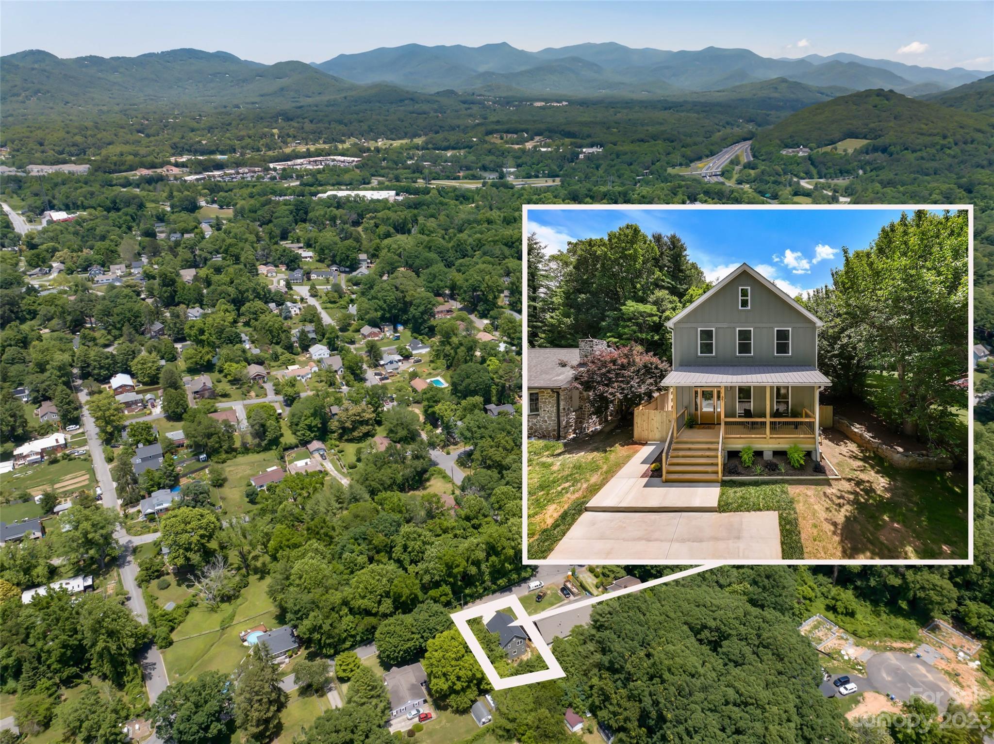 67 Raleigh Road Asheville, NC 28803 - Photo 38 of 43 an aerial view of a house with a garden