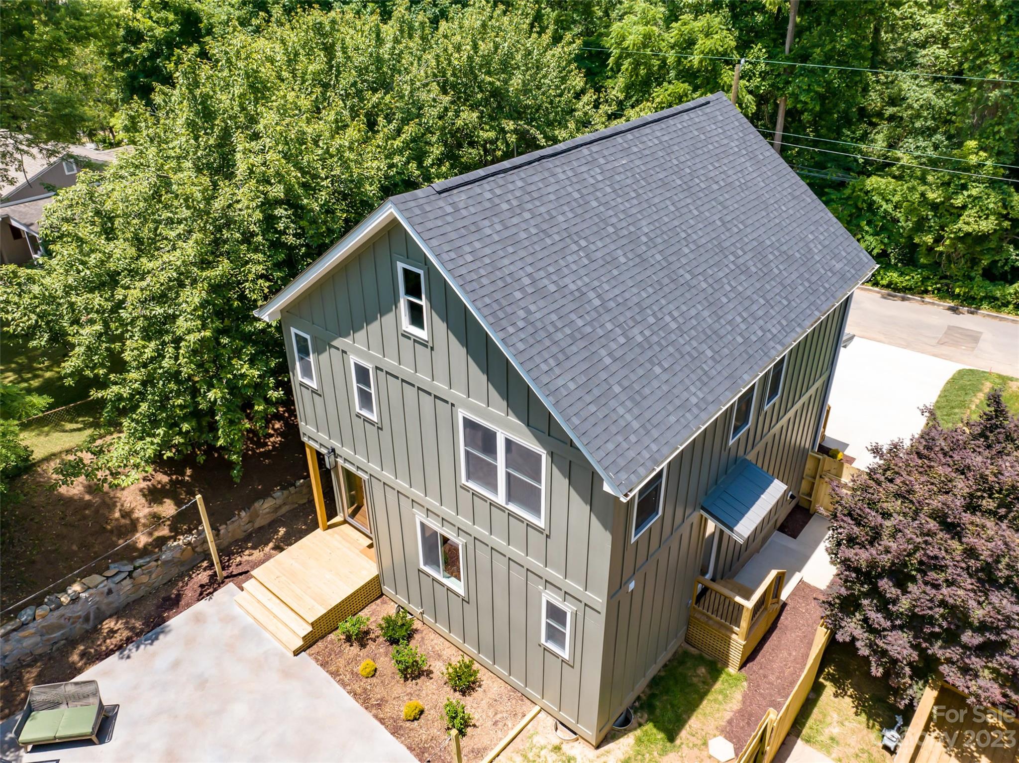67 Raleigh Road Asheville, NC 28803 - Photo 39 of 43 an aerial view of a house with swimming pool and sitting space