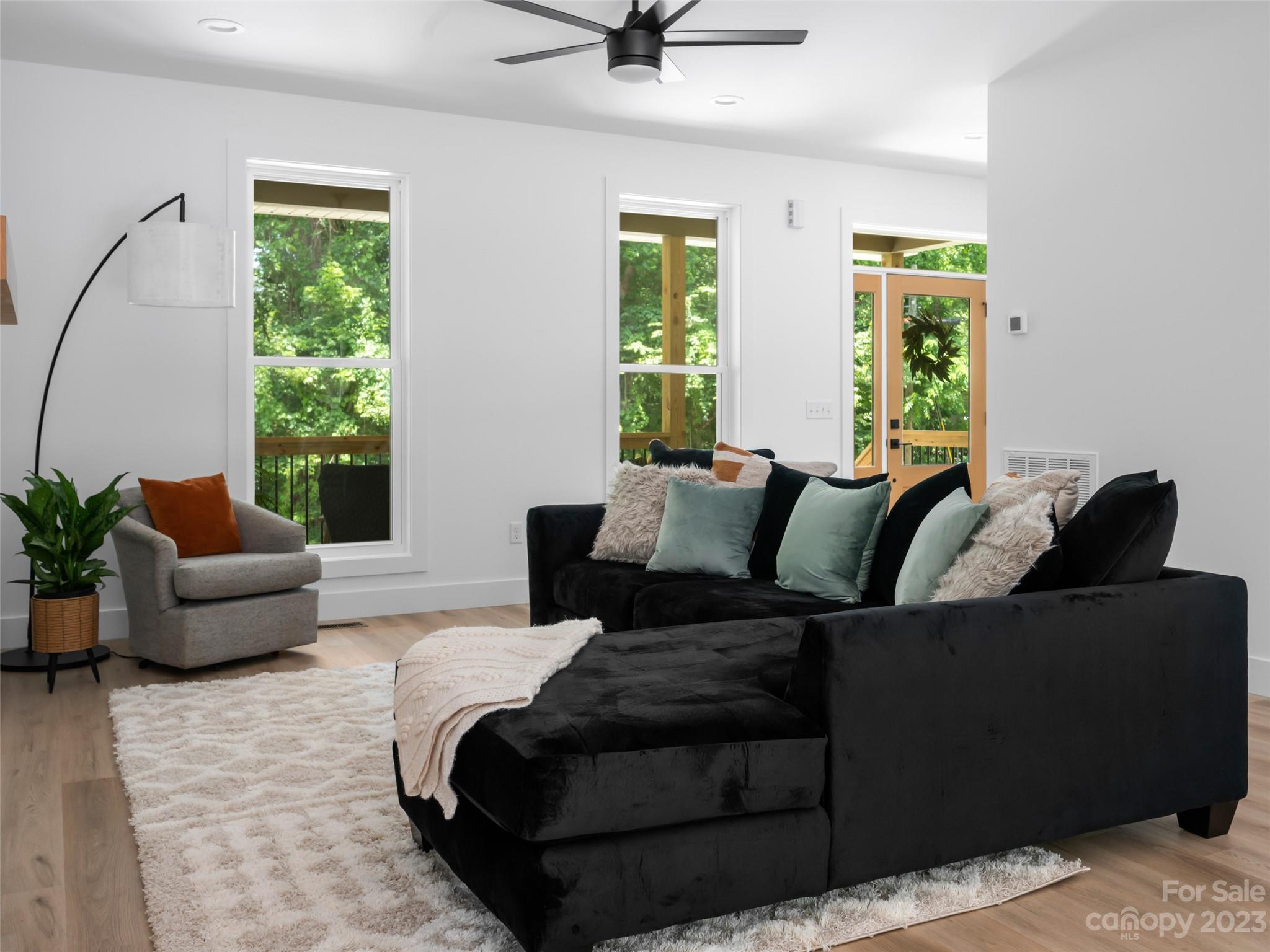 67 Raleigh Road Asheville, NC 28803 - Photo 6 of 43 a living room with furniture and a large window