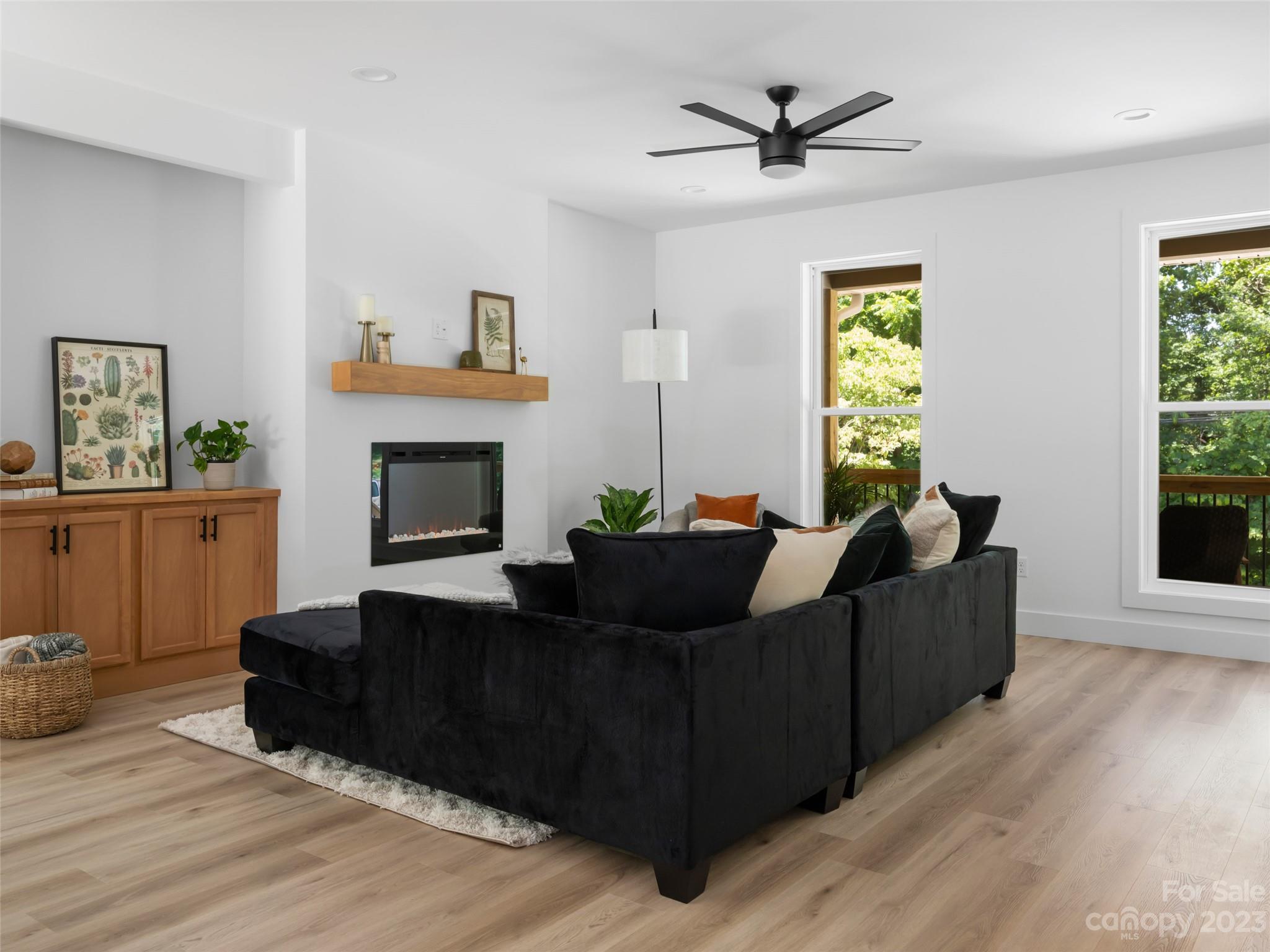 67 Raleigh Road Asheville, NC 28803 - Photo 8 of 43 a living room with furniture and a fireplace