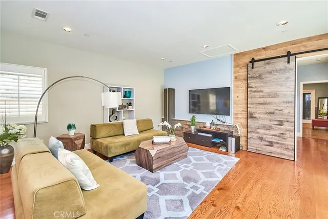 a bathroom with a sink a mirror and a shower