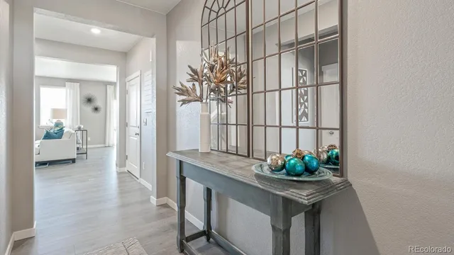 a view of a hallway and dining room