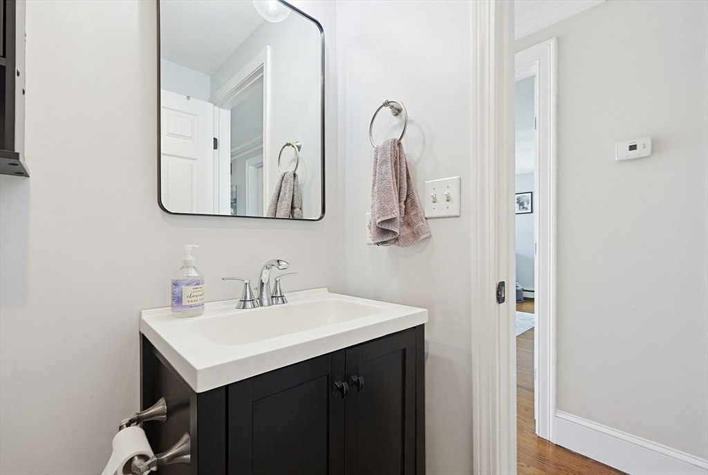 48 Calumet Street, Unit 2 Revere, MA 02151 - Photo 12 of 30 a bathroom with a sink and a mirror