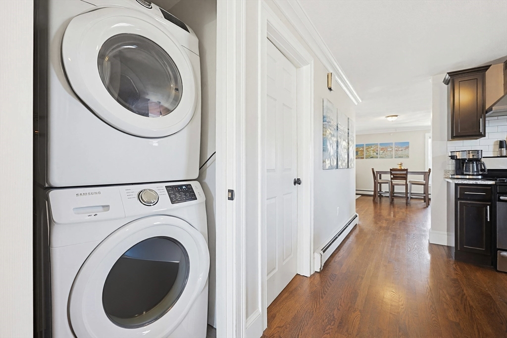 48 Calumet Street, Unit 2 Revere, MA 02151 - Photo 13 of 30 a view of a hallway with washer and dryer