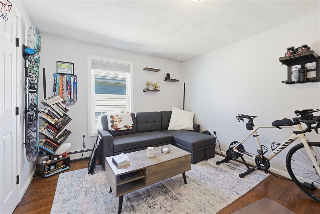 48 Calumet Street, Unit 2 Revere, MA 02151 - Photo 14 of 30 a living room with furniture a rug and a window