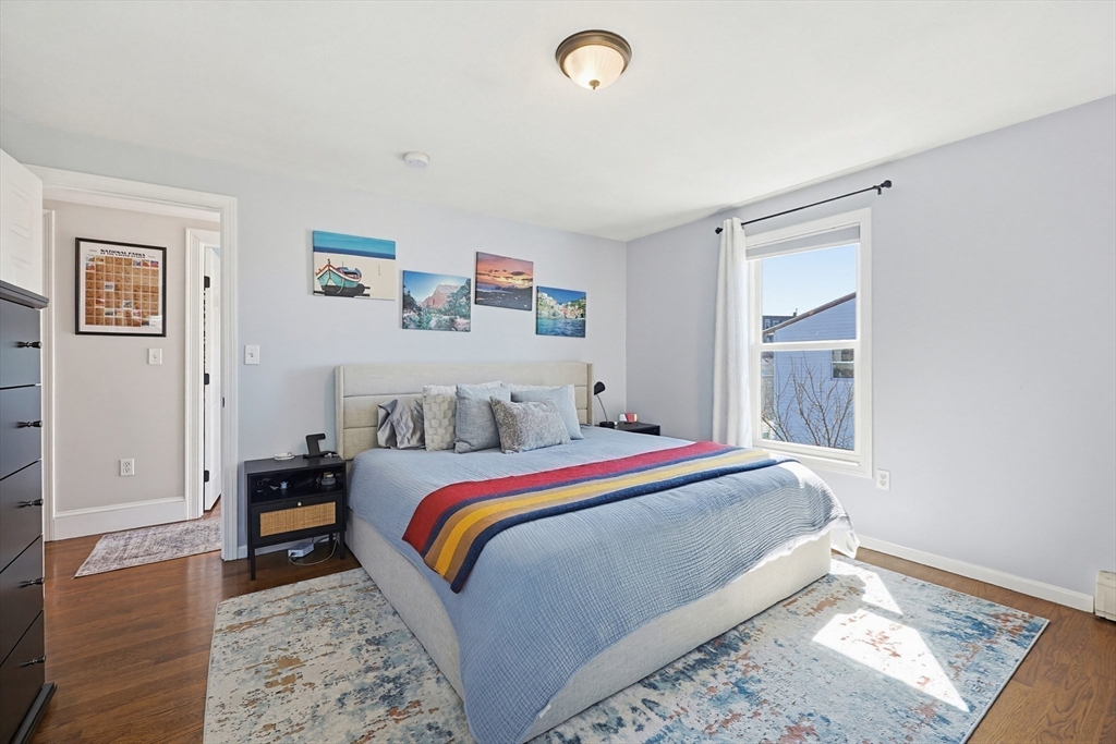 48 Calumet Street, Unit 2 Revere, MA 02151 - Photo 18 of 30 a bed room with a bed and a window