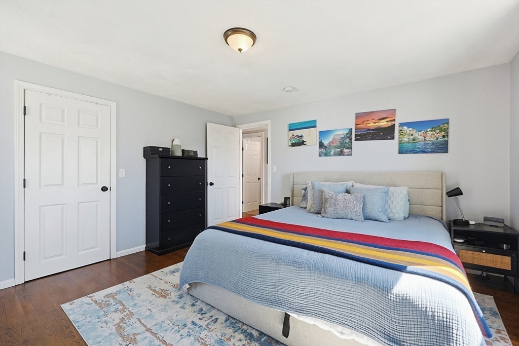48 Calumet Street, Unit 2 Revere, MA 02151 - Photo 19 of 30 a bed room with a bed and a couch