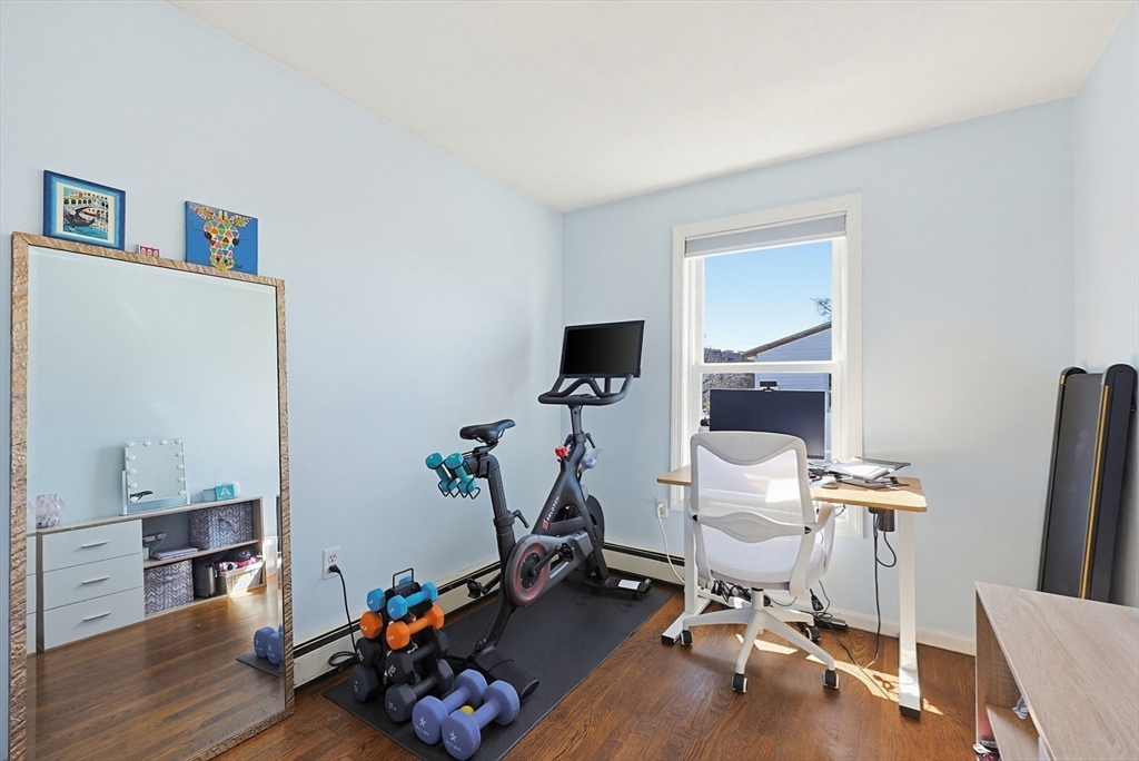 48 Calumet Street, Unit 2 Revere, MA 02151 - Photo 21 of 30 a room with furniture and wooden floor