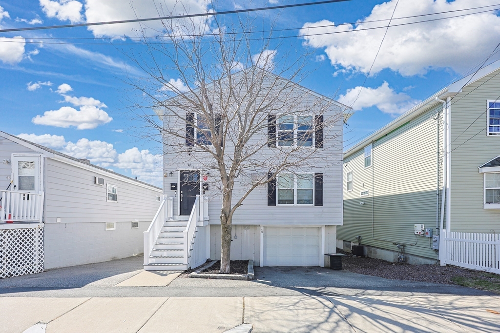48 Calumet Street, Unit 2 Revere, MA 02151 - Photo 28 of 30 a view of a house with a tree