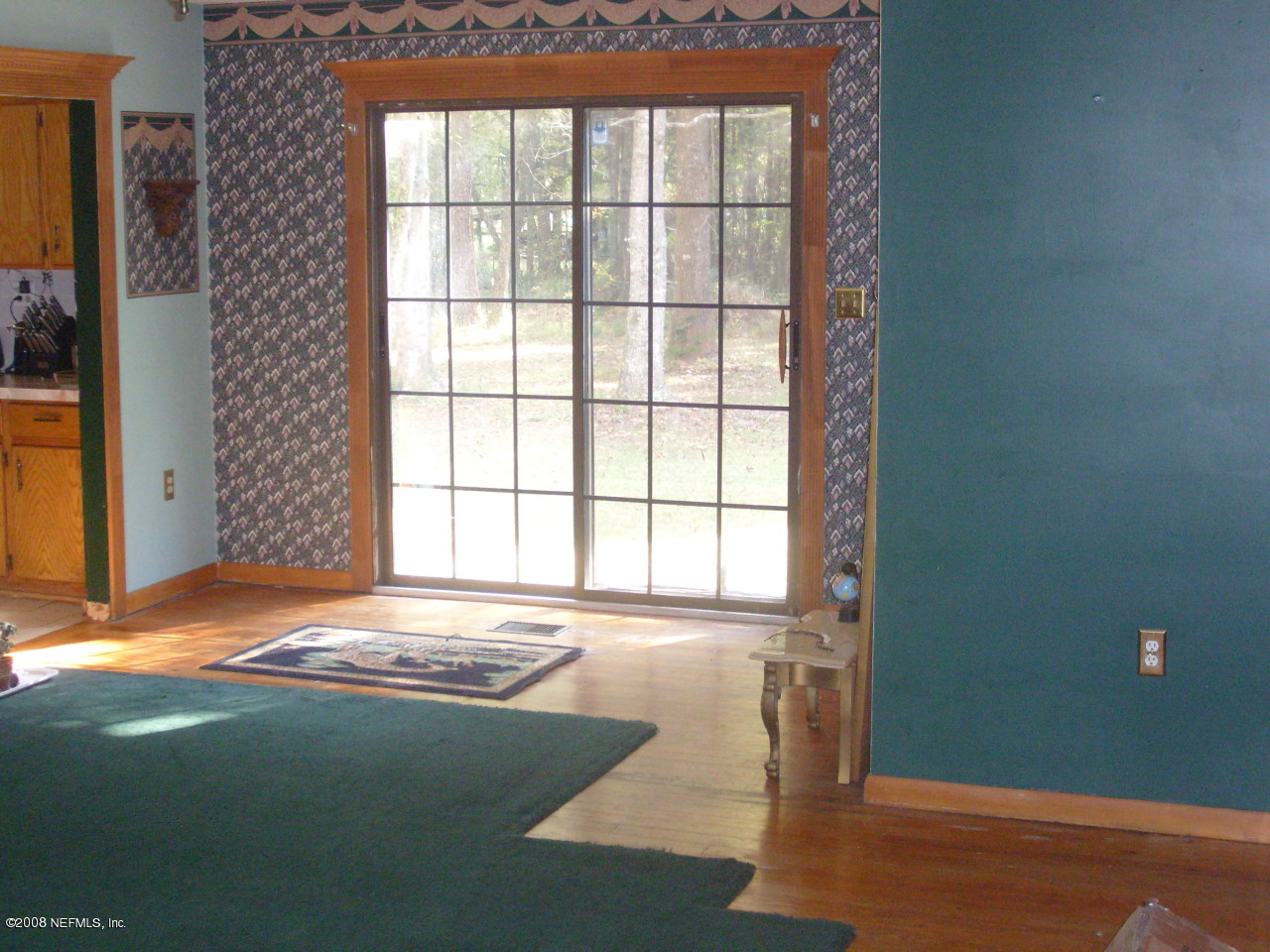 45208 Bismark Road Callahan, FL 32011 - Photo 6 of 7 a view of an empty room with a window