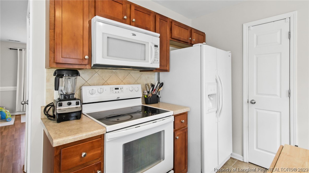 2219 Gray Goose Loop Fayetteville, NC 28306 - Photo 12 of 36 a utility room with dryer and washer