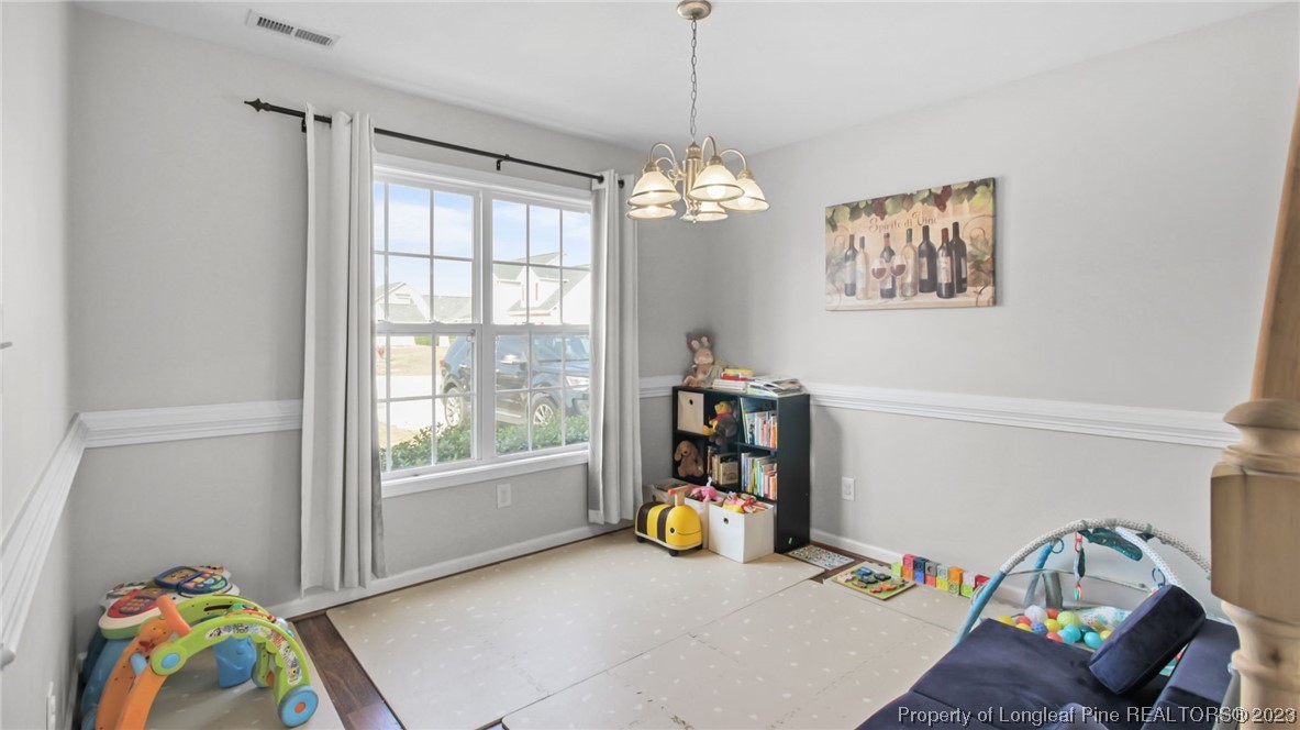 2219 Gray Goose Loop Fayetteville, NC 28306 - Photo 15 of 36 a view of a room with gym equipment