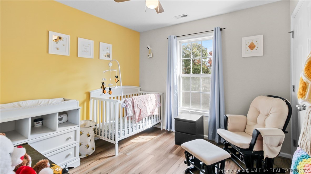 2219 Gray Goose Loop Fayetteville, NC 28306 - Photo 29 of 36 a living room with furniture and a window