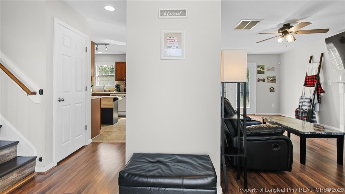 2219 Gray Goose Loop Fayetteville, NC 28306 - Photo 6 of 36 a view of a livingroom with furniture and a flat screen tv