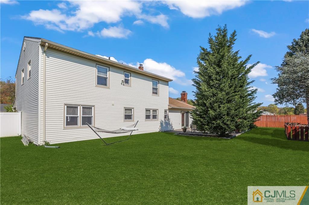 49 South Rhoda Street Monroe Township, NJ 08831 - Photo 9 of 11 a house view with a garden space