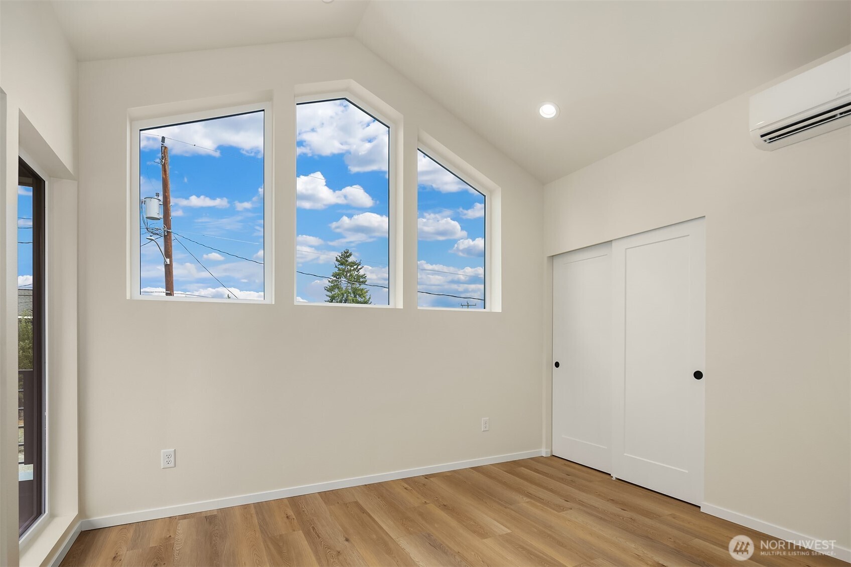 6503 Dibble Avenue Northwest Seattle, WA 98117 - Photo 12 of 15 a view of an empty room with a window