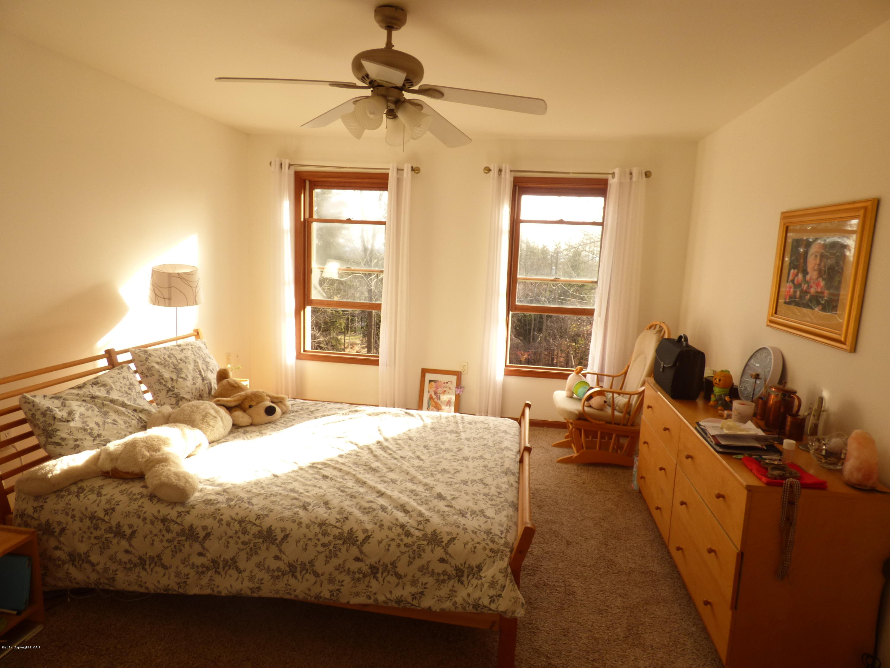 277 Rinker Road Stroudsburg, PA 18360 - Photo 10 of 17 a bed room with a bed and a window