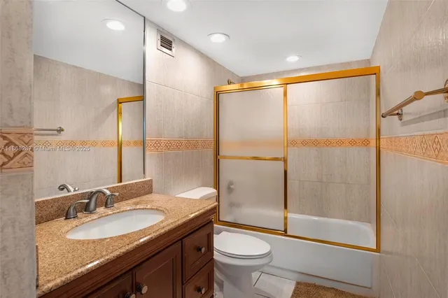 a living room with furniture a dining table and chairs