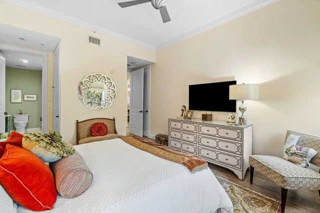 a en suite bathroom with a double vanity sink and a mirror