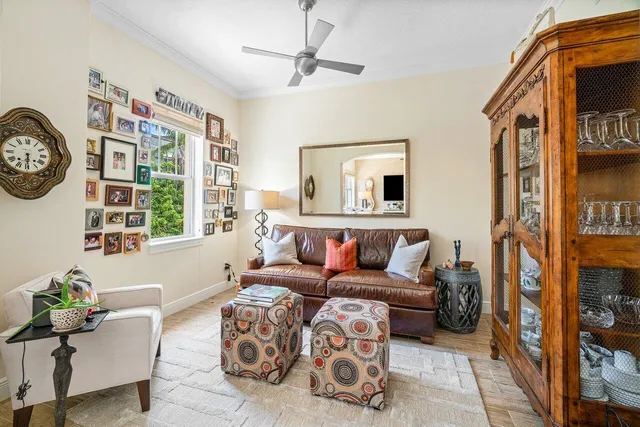 a living room with fireplace furniture and flat screen tv