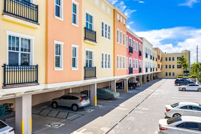 a view of a building with a sitting area