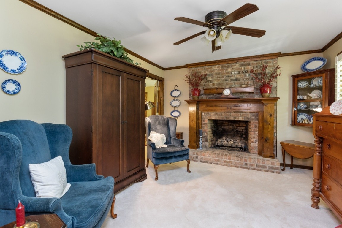 1637 North Greenhill Road Mount Juliet, TN 37122 - Photo 3 of 35 a living room with furniture and a fireplace