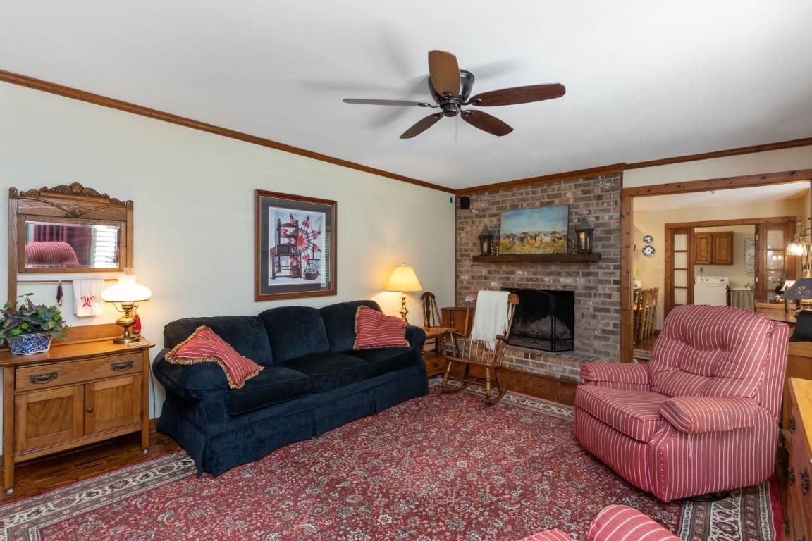 1637 North Greenhill Road Mount Juliet, TN 37122 - Photo 6 of 35 a living room with furniture a fireplace and a window