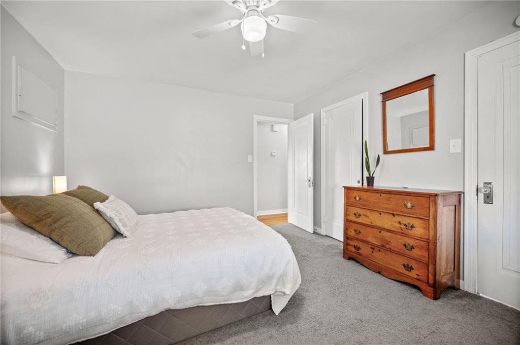 416 Phillips Avenue McKees Rocks, PA 15136 - Photo 22 of 46 a bedroom with a bed and a dresser