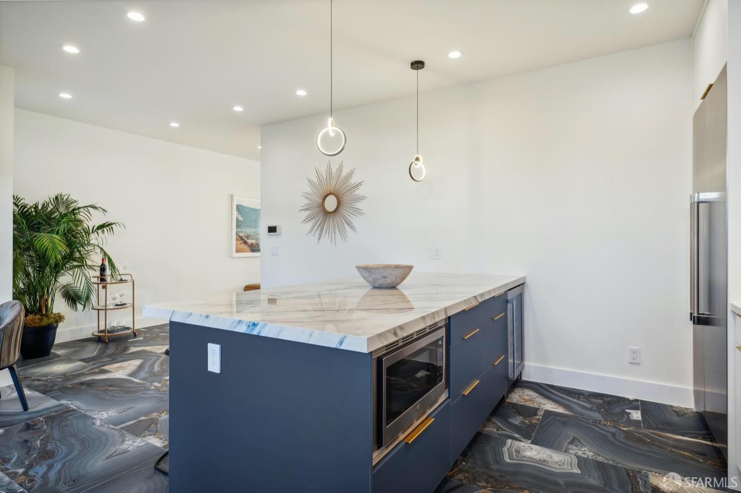 1544 45th Avenue San Francisco, CA 94122 - Photo 16 of 51 a room with a sink a counter and a potted plant
