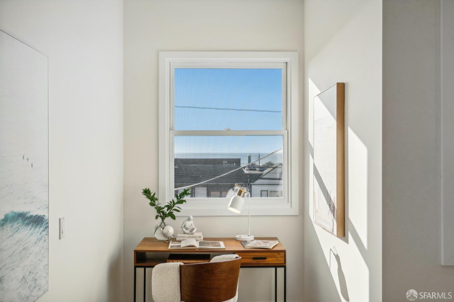 1544 45th Avenue San Francisco, CA 94122 - Photo 31 of 51 a bathroom with a sink and a mirror