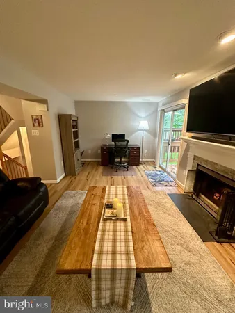a living room with a couch and a flat screen tv