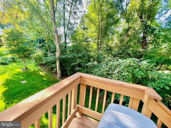 a view of balcony with yard