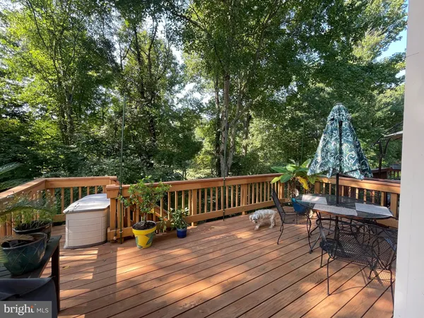 a view of roof deck with patio