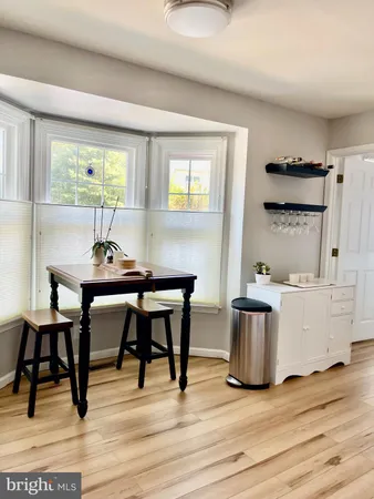 a workspace with furniture and window