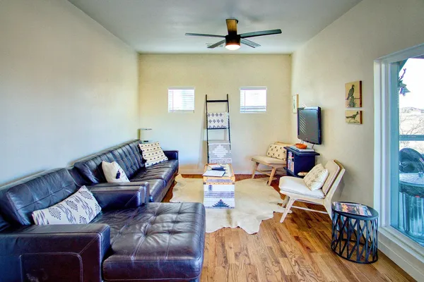 a living room with furniture and a window
