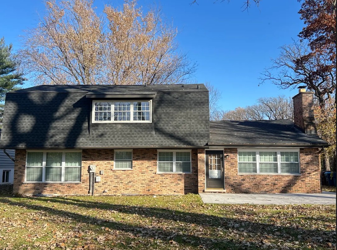 438 Hamilton Wood Homewood, IL 60430 - Photo 4 of 39 a front view of a house with a yard