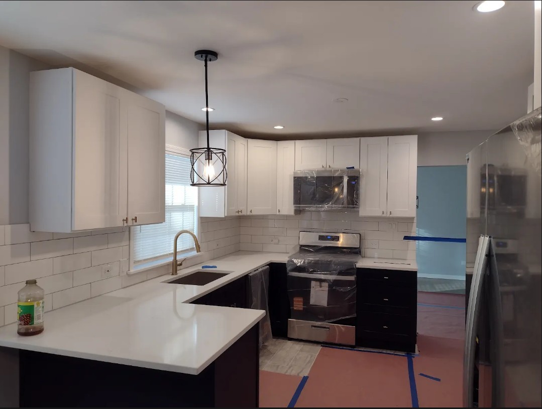 438 Hamilton Wood Homewood, IL 60430 - Photo 6 of 39 a kitchen with stainless steel appliances granite countertop a sink a stove and a refrigerator