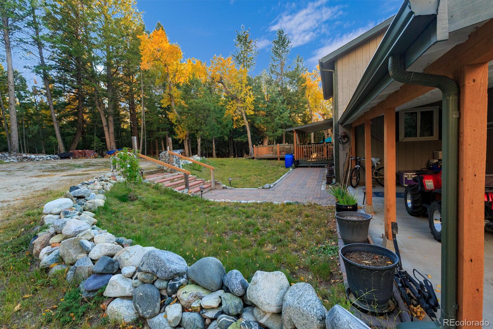 203 Hampton Run Road Mosca, CO 81146 - Photo 4 of 33 a backyard of a house with lots of green space